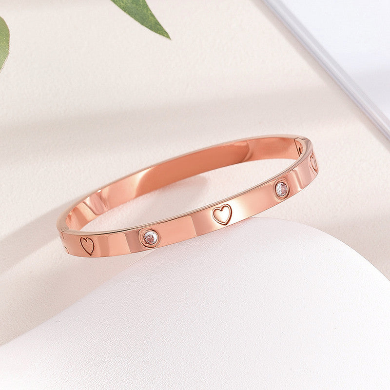 Jewels Galaxy Stainless Steel Astonishing Rose Gold Plated Love AD Bracelet For Women