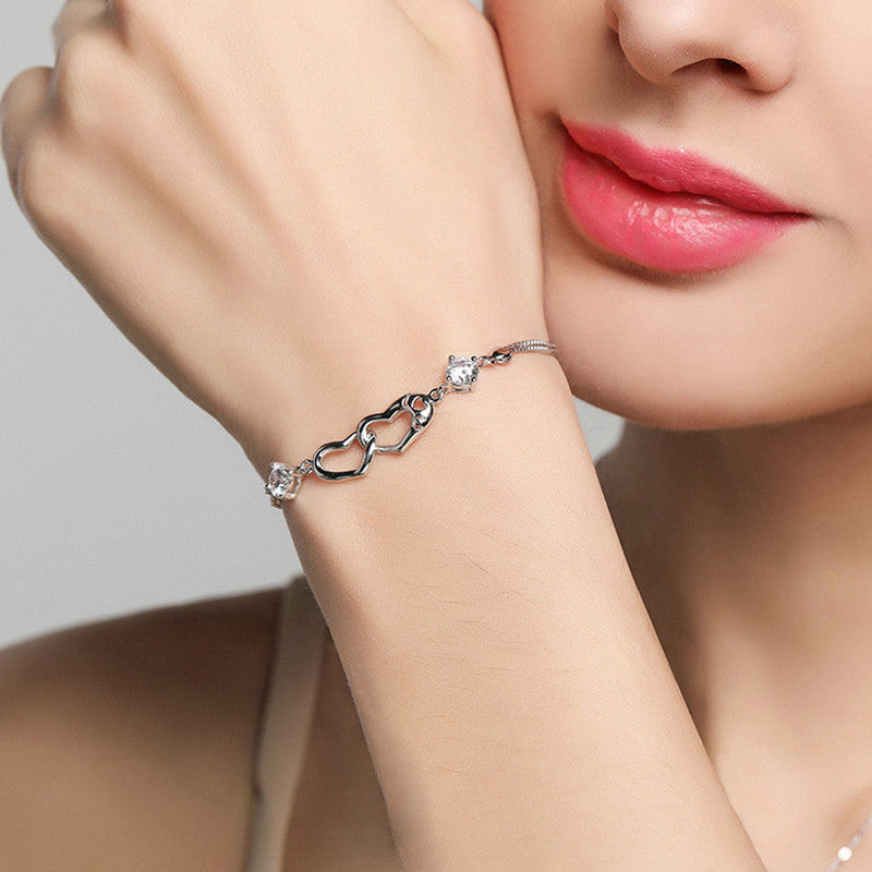 Jewels Galaxy Silver Plated Heart Themed Anti Tarnish Bracelet