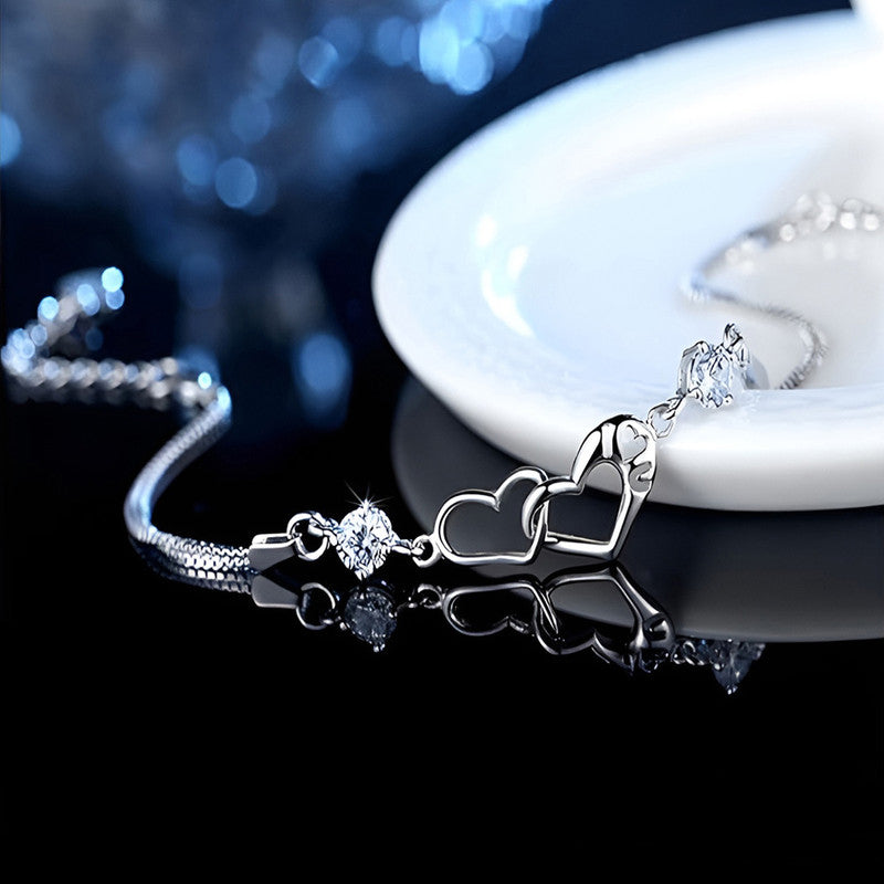 Jewels Galaxy Silver Plated Heart Themed Anti Tarnish Bracelet