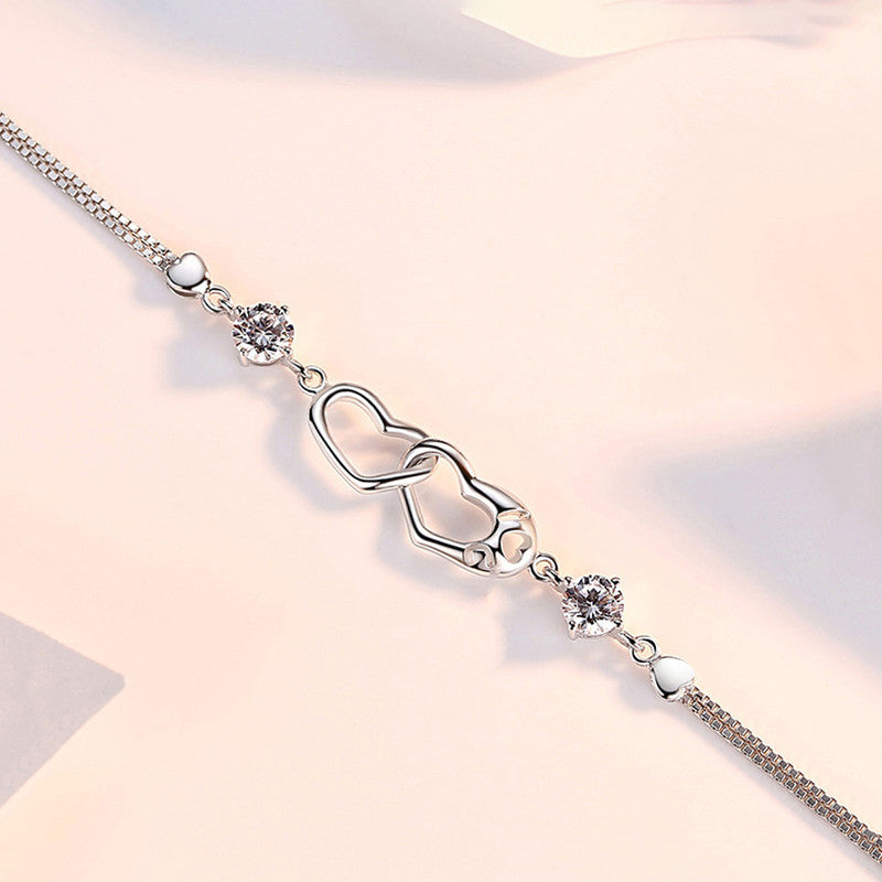 Jewels Galaxy Silver Plated Heart Themed Anti Tarnish Bracelet