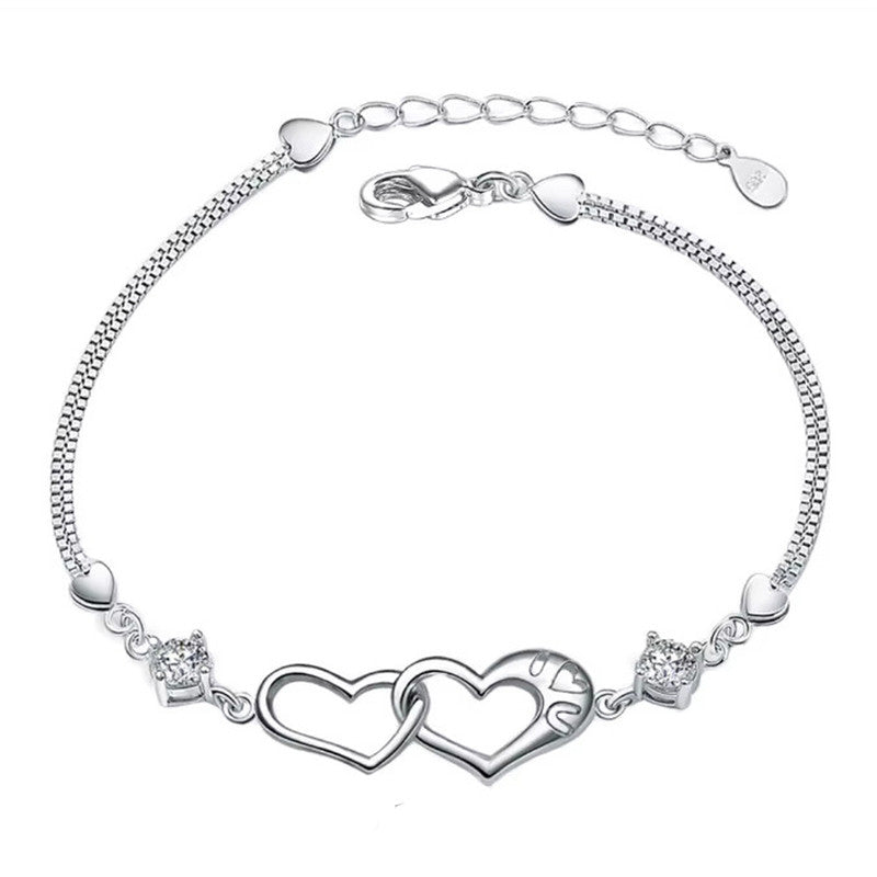 Jewels Galaxy Silver Plated Heart Themed Anti Tarnish Bracelet