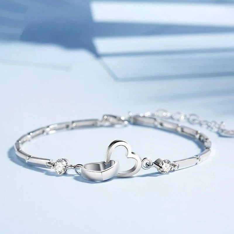 Jewels Galaxy Silver Plated Heart Themed Anti Tarnish Bracelet