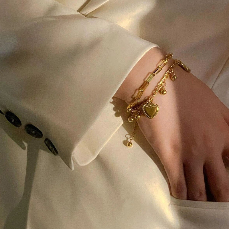 Jewels Galaxy Gold Plated Stainless Steel Anti Tarnish Heart themed Wraparound Bracelet For Women