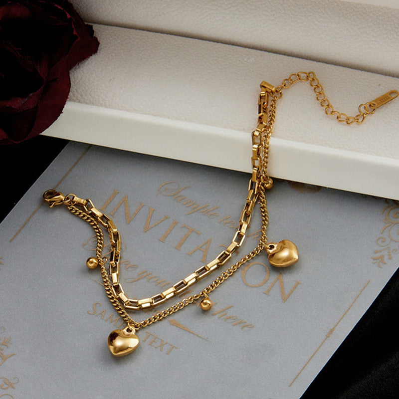 Jewels Galaxy Gold Plated Stainless Steel Anti-Tarnish Heart Themed Wraparound Bracelet