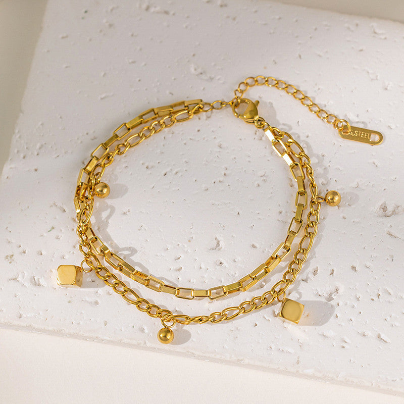 Jewels Galaxy Gold Plated Anti Tarnish Stainless Steel Cube themed Wraparound Bracelet