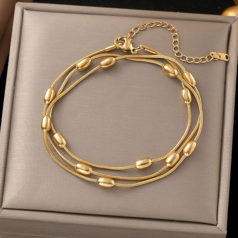 Jewels Galaxy Gold Plated Anti Tarnish Stainless Steel Triple Strand Necklace Bracelet cum Necklace