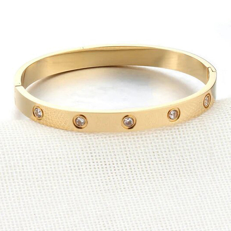 Jewels Galaxy Stainless Steel Contemporary Gold Plated Love AD Anti-Tarnish Bracelet For Women