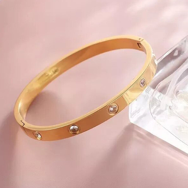 Jewels Galaxy Stainless Steel Contemporary Rose Gold Plated Love AD Bracelet For Women