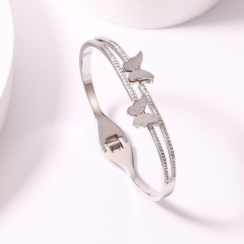 Jewels Galaxy Stainless Steel Butterfly AD Studded Anti-Tarnish Bracelet For Women