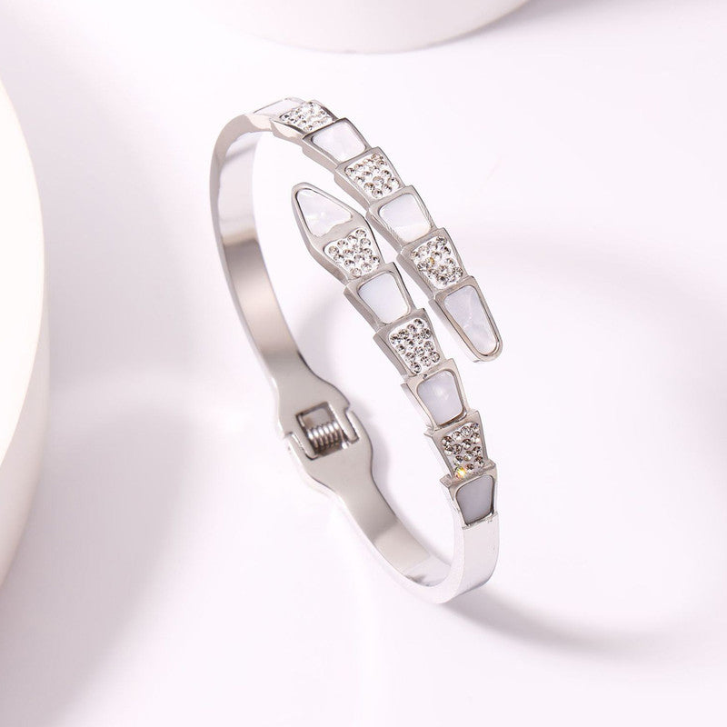 Jewels Galaxy Stainless Steel Mother of Pearl Snake Styled AD Studded Anti-Tarnish Bracelet