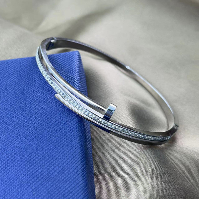 Jewels Galaxy Stainless Steel American Diamond Studded Anti-Tarnish Bracelet For Women