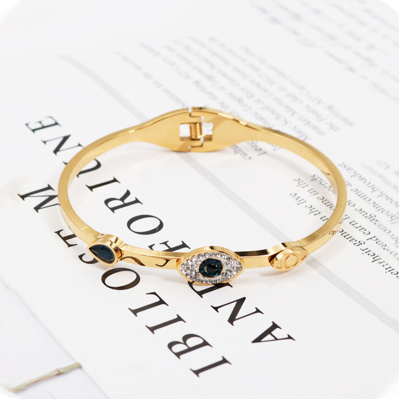 Jewels Galaxy Stainless Steel AD Evil Eye Bangle-Style Anti-Tarnish Bracelet For Women