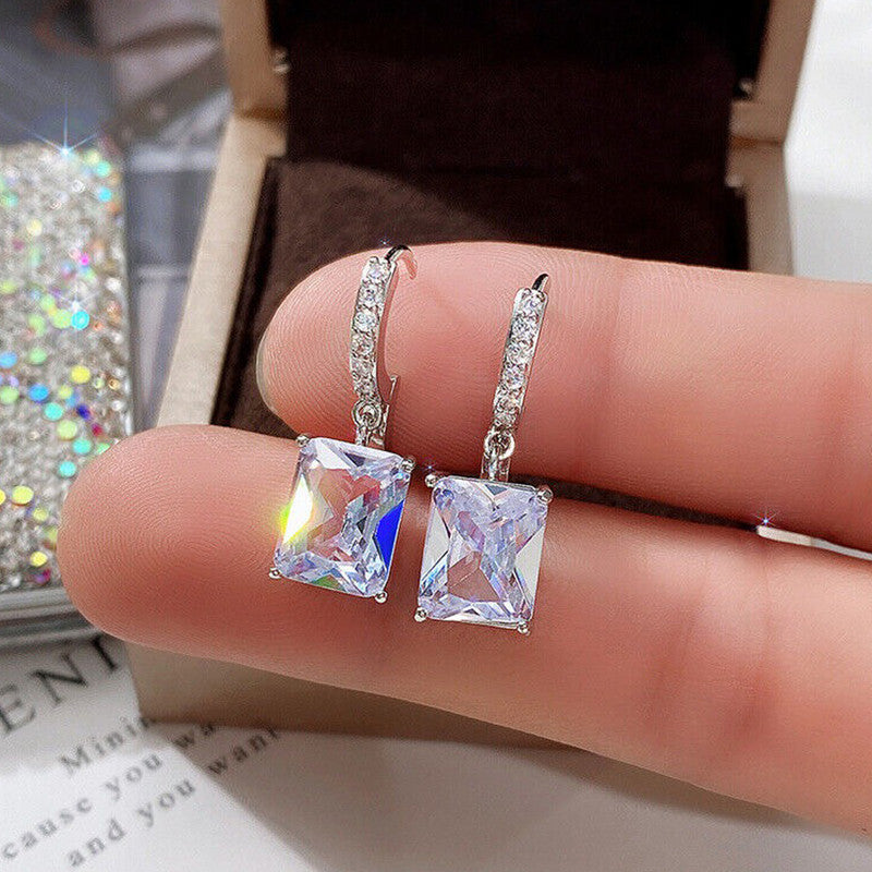 Jewels Galaxy Silver Plated Rectangular American Diamond Studded Crushed Ice Cut Drop Earrings