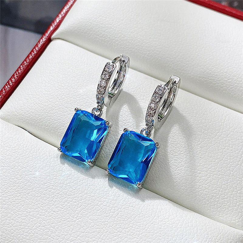 Jewels Galaxy Silver Plated Rectangular American Diamond Studded Crushed Ice Cut Drop Earrings