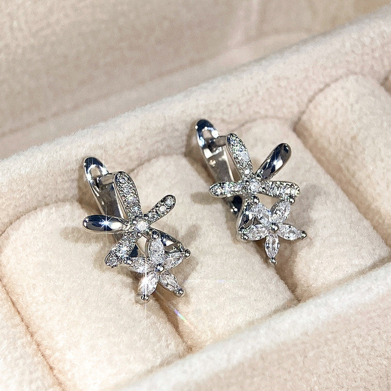 Jewels Galaxy American Diamond Studded Dual Star Shaped Clip-On Earrings
