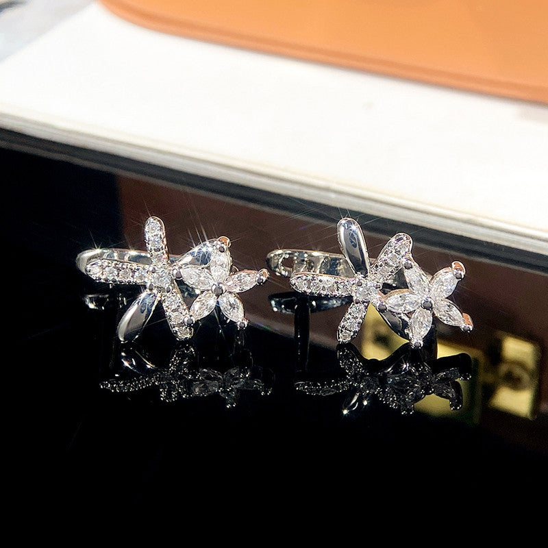 Jewels Galaxy American Diamond Studded Dual Star Shaped Clip-On Earrings