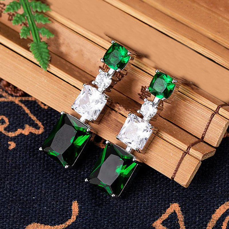 Jewels Galaxy Silver Plated American Diamond Studded Geometrical Crushed Ice Cut Drop Earrings
