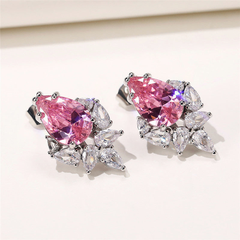 Jewels Galaxy Silver Plated American Diamond Studded Crushed Ice Cut Drop Earrings