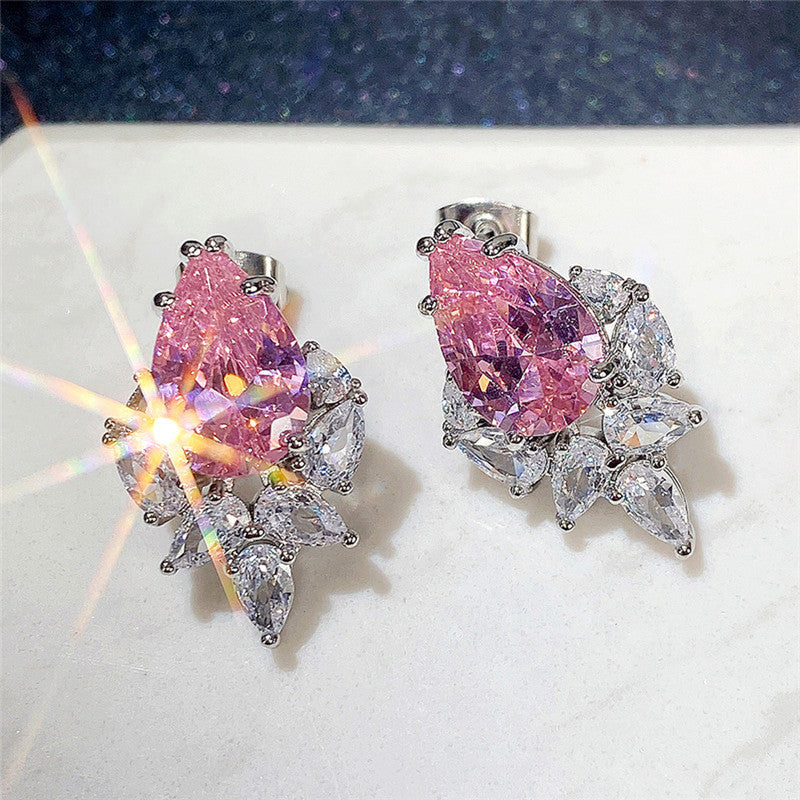 Jewels Galaxy Silver Plated American Diamond Studded Crushed Ice Cut Drop Earrings