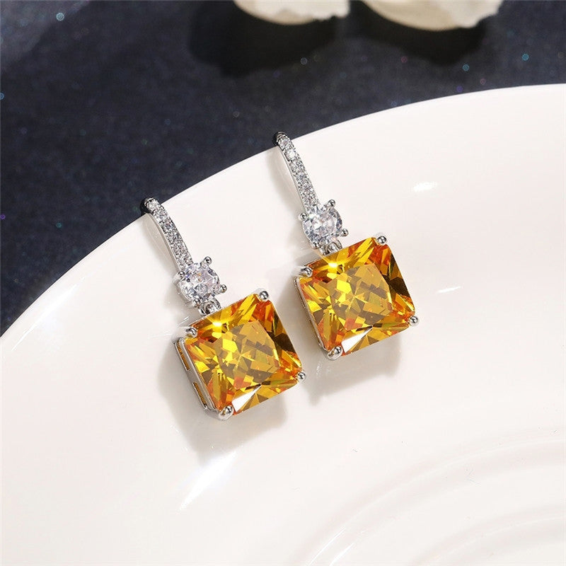 Jewels Galaxy Silver Plated AD Studded Yellow Square Shape Crushed Ice Cut Hanging Earrings