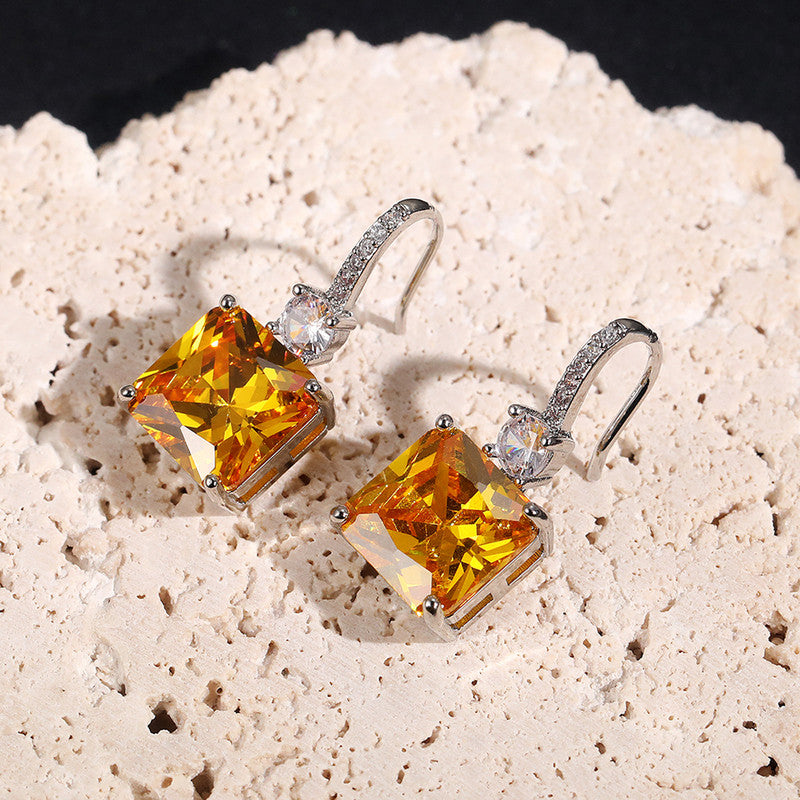 Jewels Galaxy Silver Plated AD Studded Yellow Square Shape Crushed Ice Cut Hanging Earrings