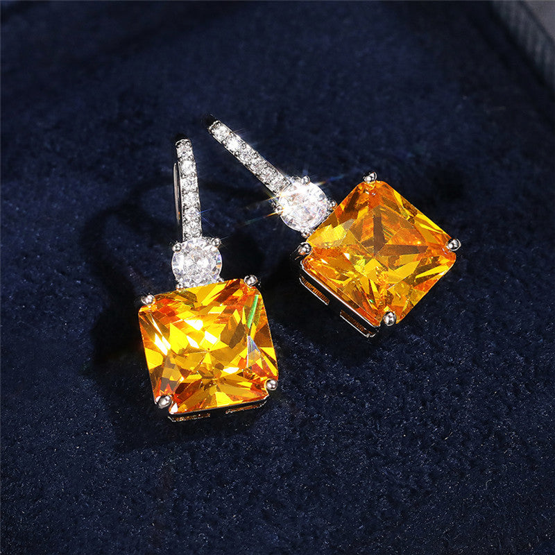 Jewels Galaxy Silver Plated AD Studded Yellow Square Shape Crushed Ice Cut Hanging Earrings