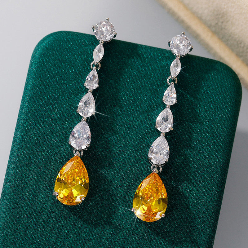 Jewels Galaxy Silver Plated AD Studded Yellow Teardrop Shape Crushed Ice Cut Drop Earrings