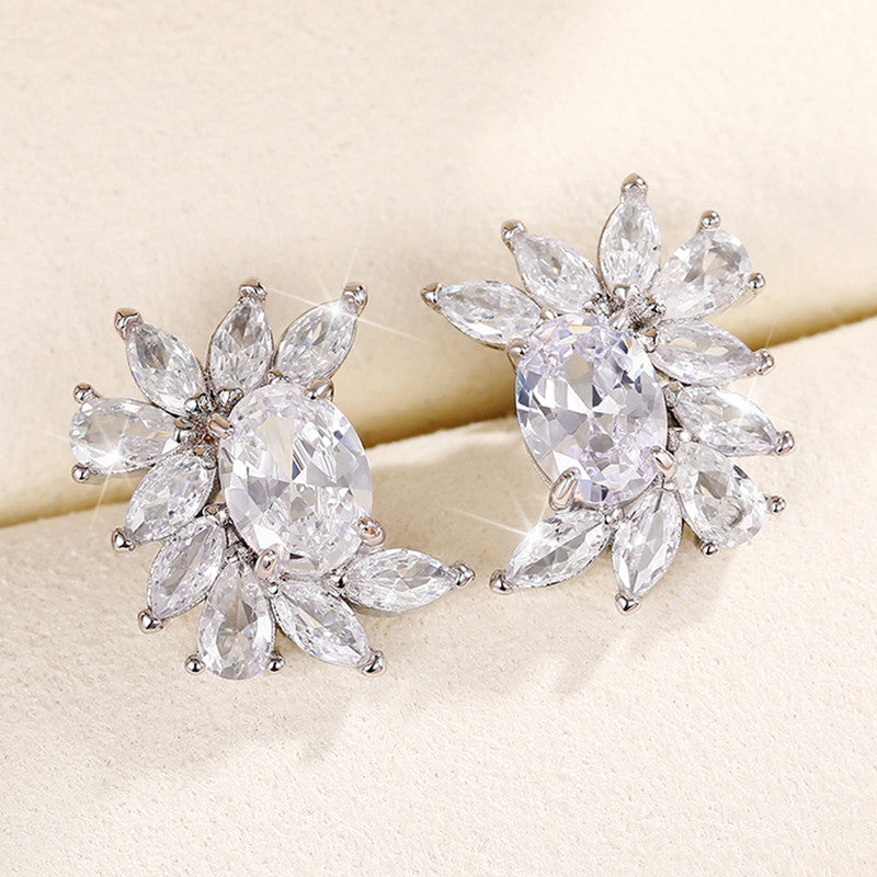 Jewels Galaxy Silver Plated American Diamond Studded Crushed Ice Cut Stud Earrings