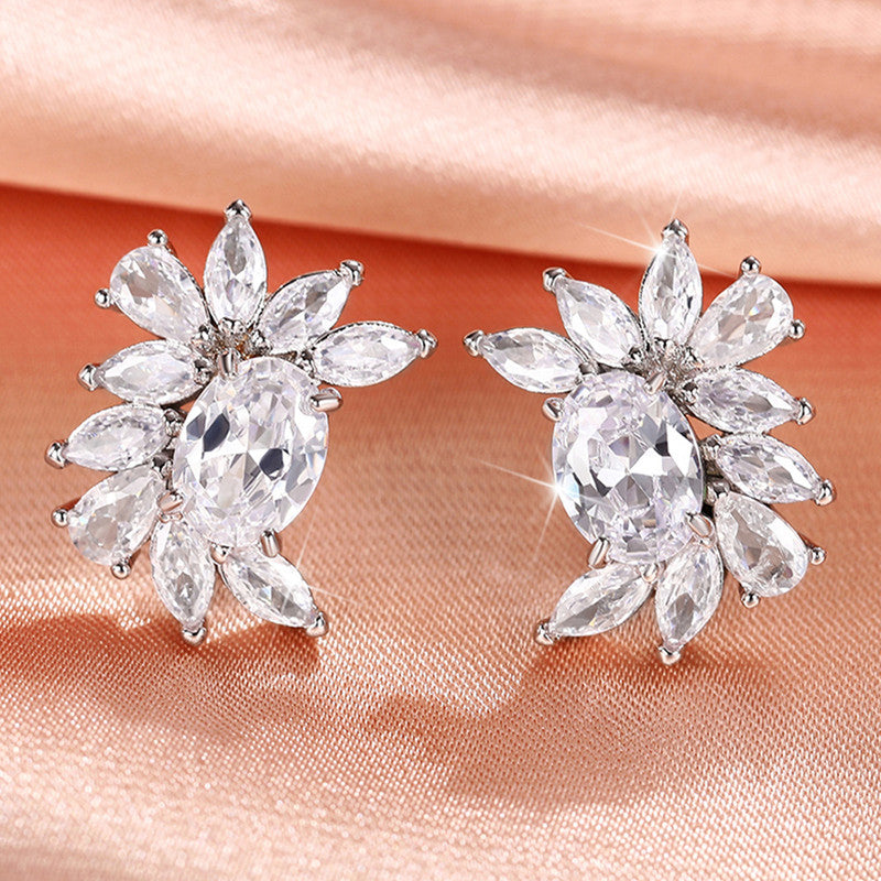 Jewels Galaxy Silver Plated American Diamond Studded Crushed Ice Cut Stud Earrings