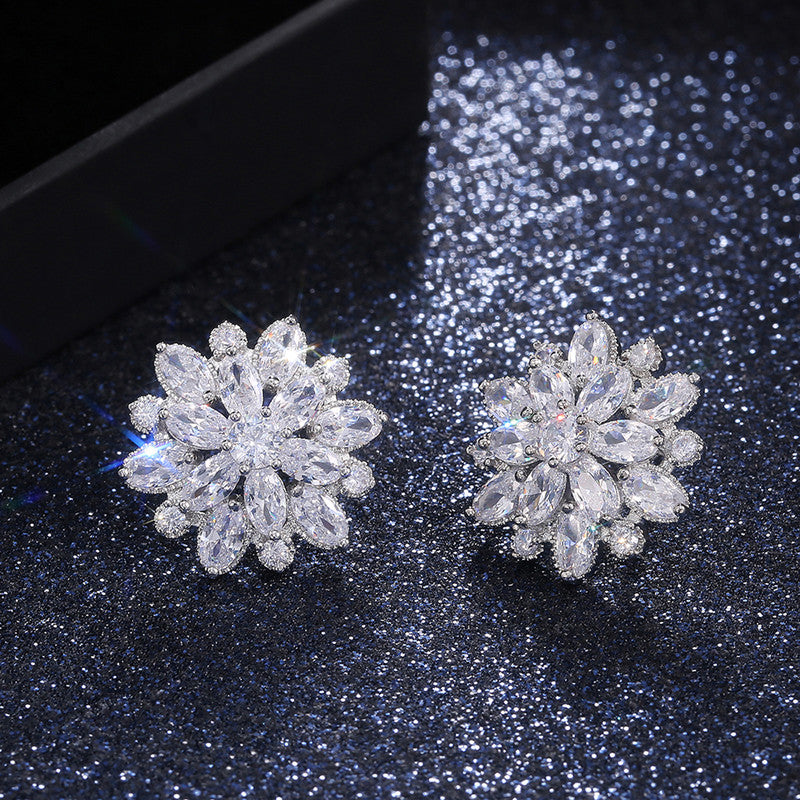Jewels Galaxy Silver Plated American Diamond Studded Floral Silver Stud Earrings