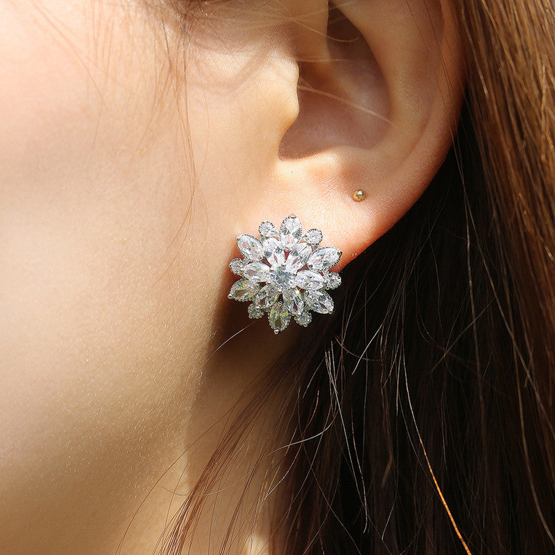 Jewels Galaxy Silver Plated American Diamond Studded Floral Silver Stud Earrings
