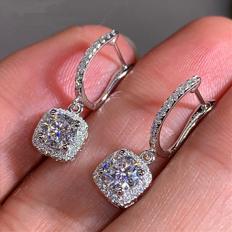 Jewels Galaxy Silver Plated American Diamond Studded Rectangular Crushed Ice Cut Drop Earrings