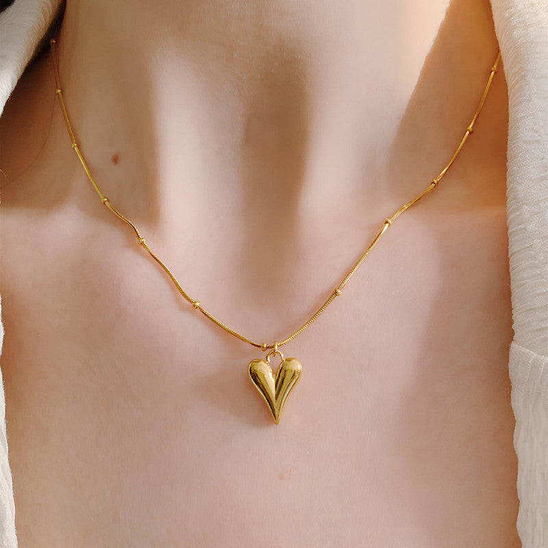 Jewels Galaxy Gold-Plated Anti Tarnish Heart themed Stainless Steel Pendant