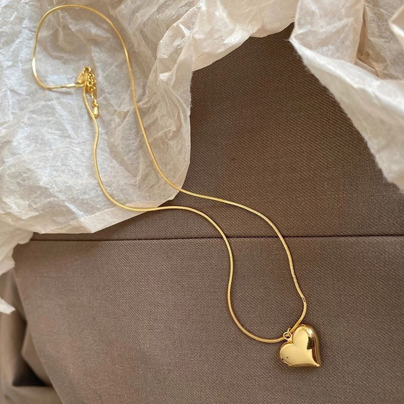 Jewels Galaxy Gold-Plated Anti Tarnish Heart Themed Pendant