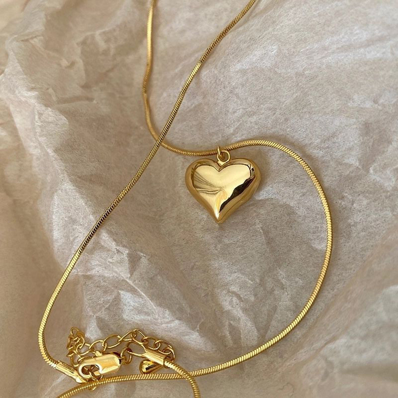 Jewels Galaxy Gold-Plated Anti Tarnish Heart Themed Pendant