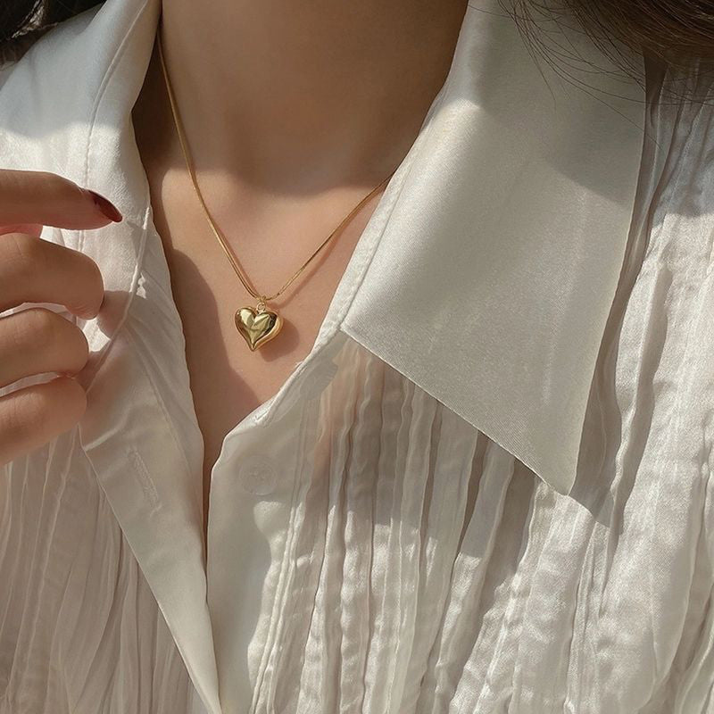 Jewels Galaxy Gold-Plated Anti Tarnish Heart Themed Pendant