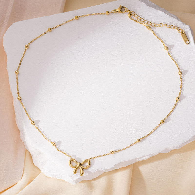 Jewels Galaxy Gold-Plated Anti Tarnish Infinity Bow Pendant