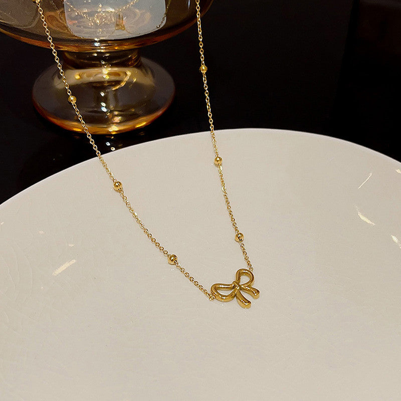 Jewels Galaxy Gold-Plated Anti Tarnish Infinity Bow Pendant