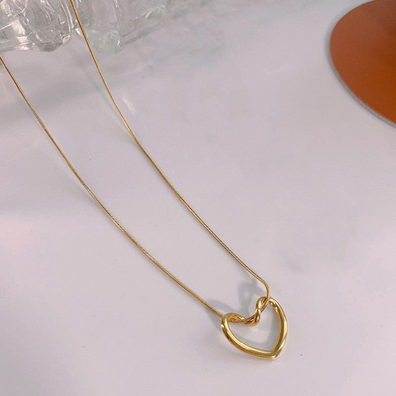Jewels Galaxy Gold-Plated Anti Tarnish Heart Themed Pendant