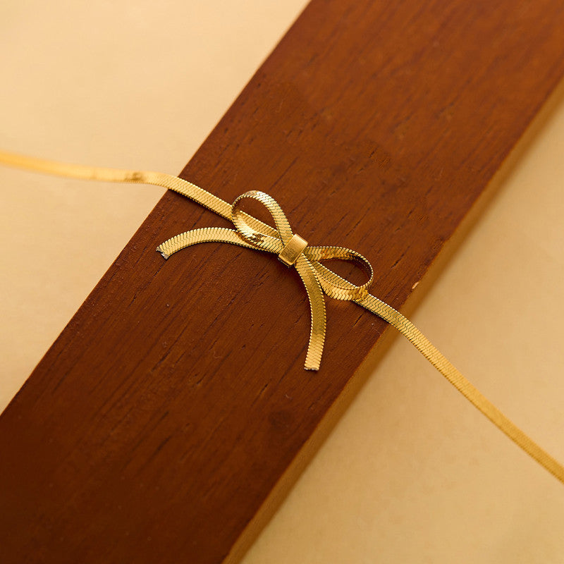 Jewels Galaxy Gold-Plated Anti Tarnish Infinity Bow Choker Necklace