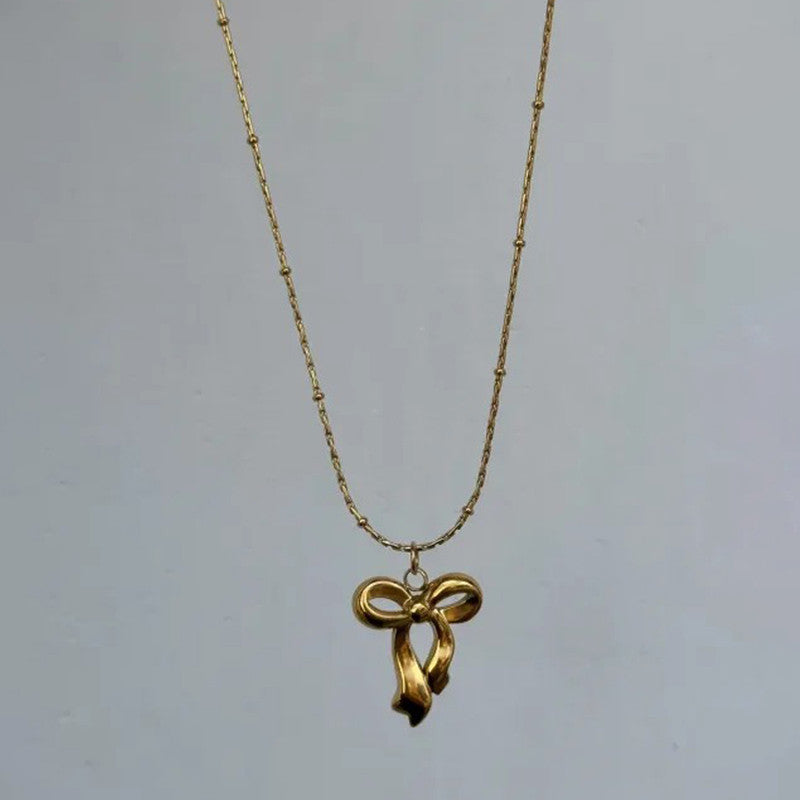Jewels Galaxy Gold-Plated Anti Tarnish Infinity Bow Pendant