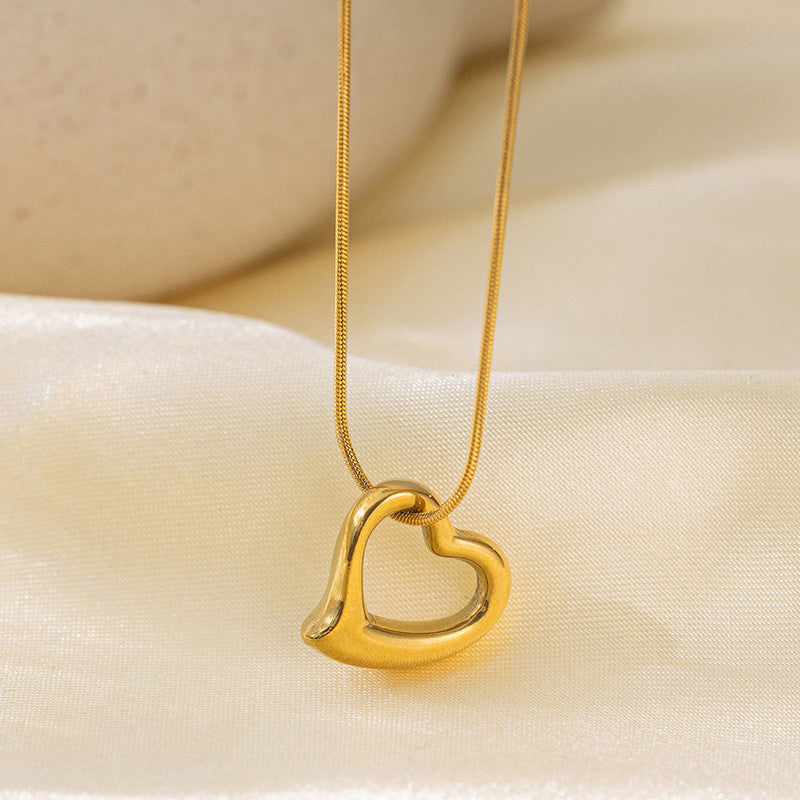 Jewels Galaxy Gold-Plated Anti Tarnish Heart Themed Pendant