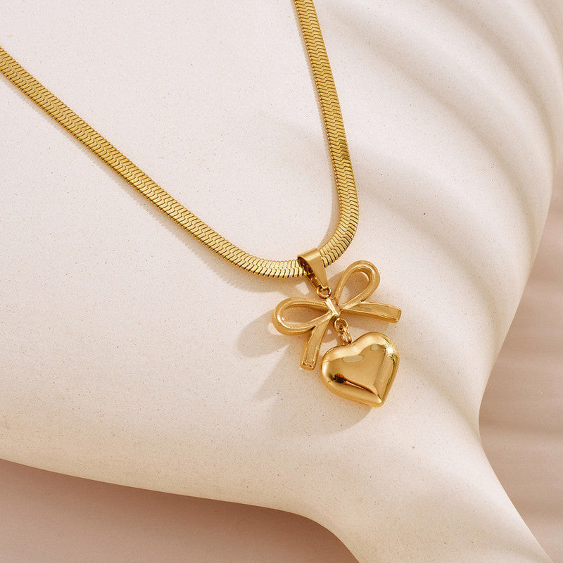 Jewels Galaxy Gold Plated Anti Tarnish Bow Knot Heart Themed Pendant