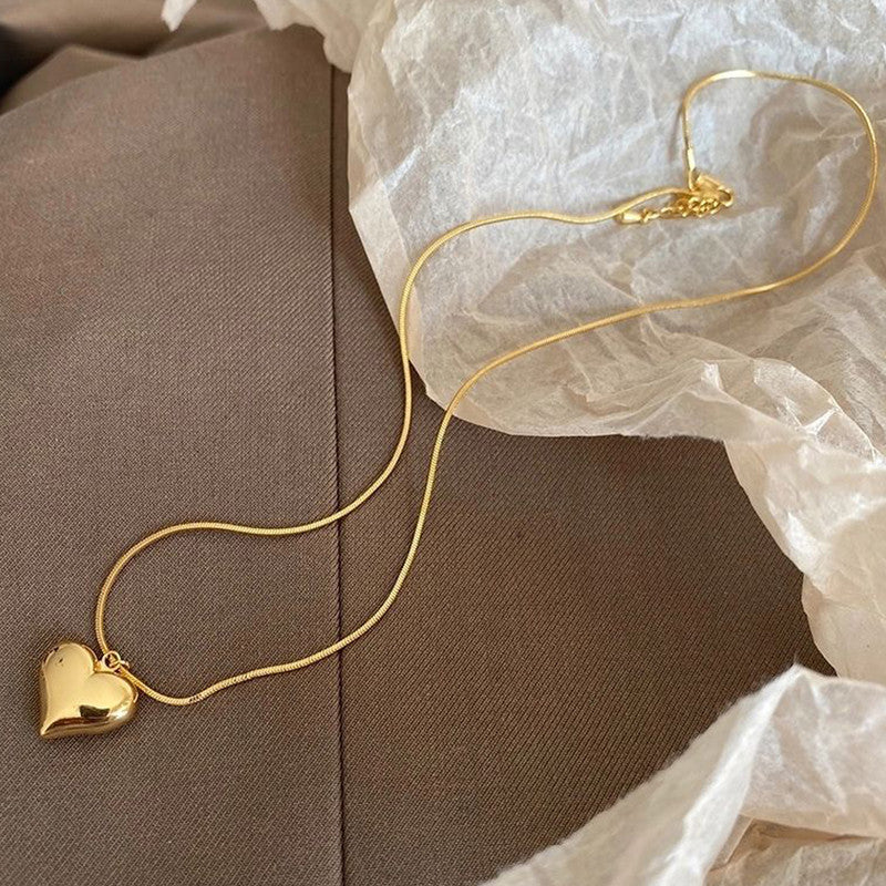 Jewels Galaxy Gold-Plated Anti Tarnish Heart Themed Pendant