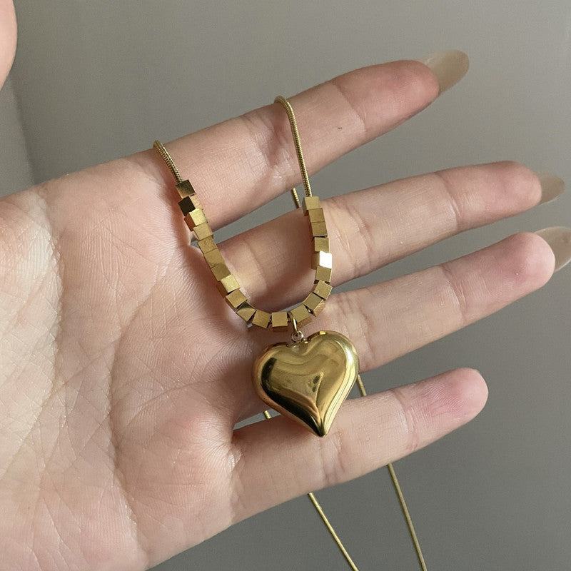 Jewels Galaxy Gold-Plated Anti Tarnish Heart Themed Pendant