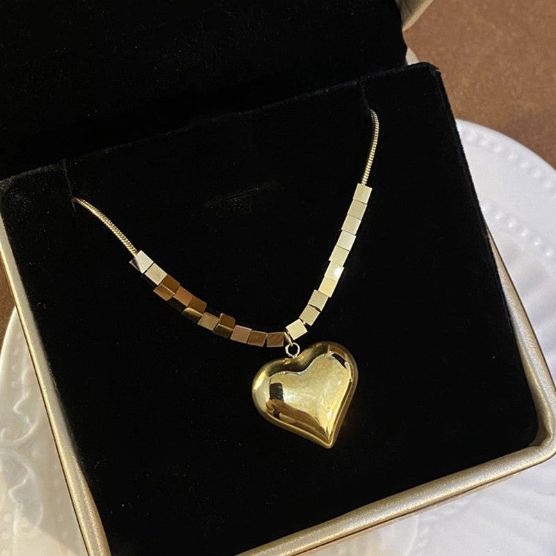Jewels Galaxy Gold-Plated Anti Tarnish Heart Themed Pendant