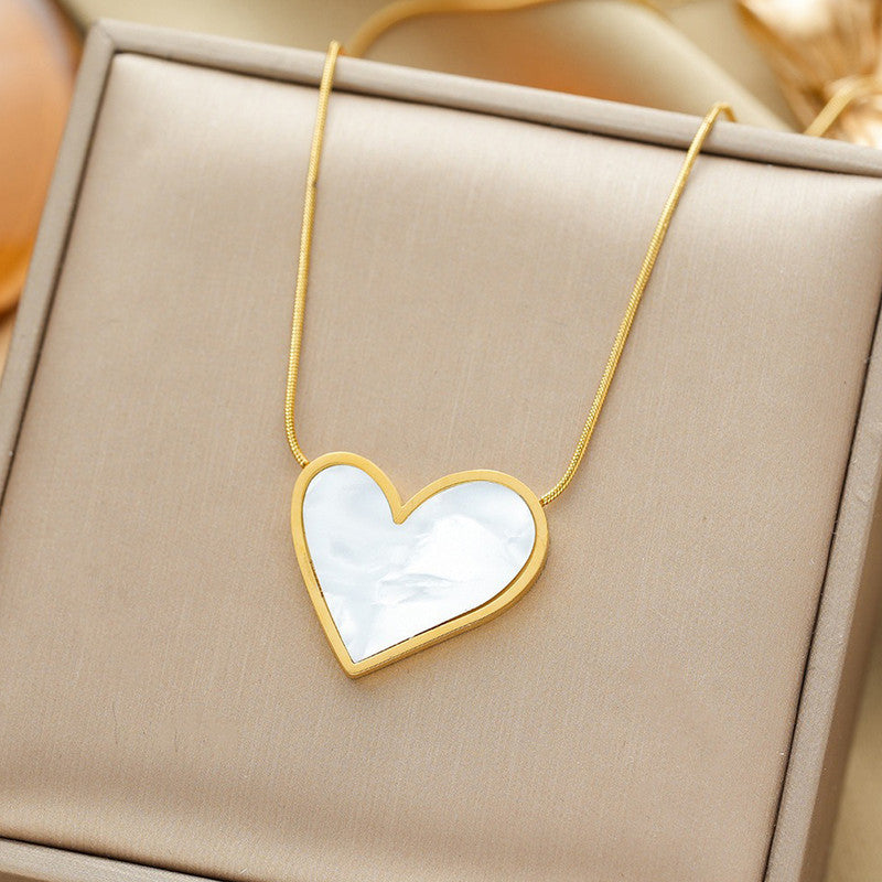 Jewels Galaxy Gold-Plated Anti Tarnish Heart Themed MOP Pendant