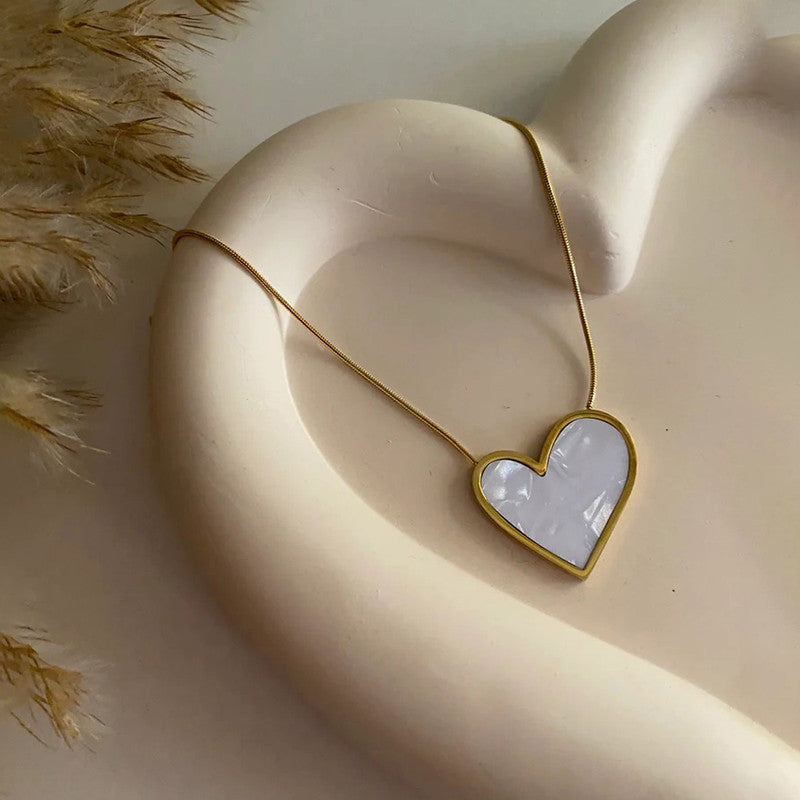 Jewels Galaxy Gold-Plated Anti Tarnish Heart Themed MOP Pendant