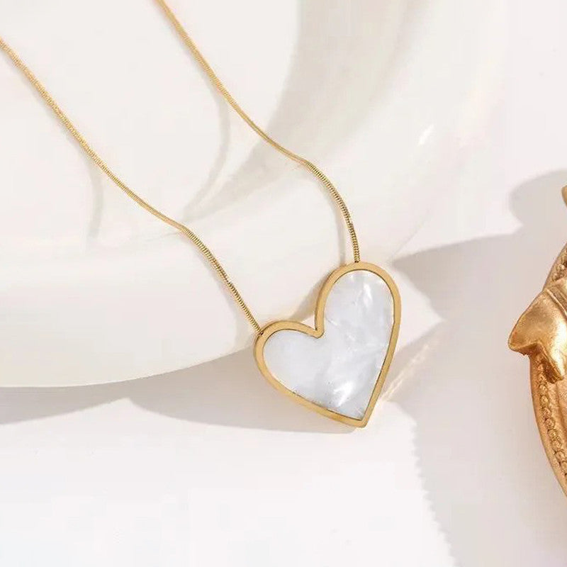 Jewels Galaxy Gold-Plated Anti Tarnish Heart Themed MOP Pendant
