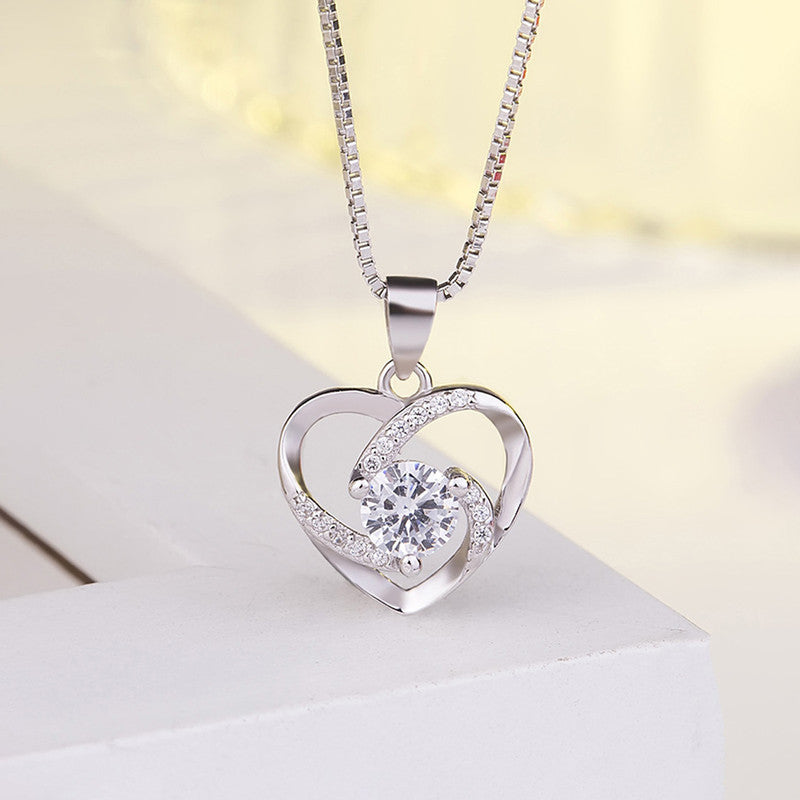 Jewels Galaxy Silver Plated Anti Tarnish American Diamond Studded Heart Themed Pendant
